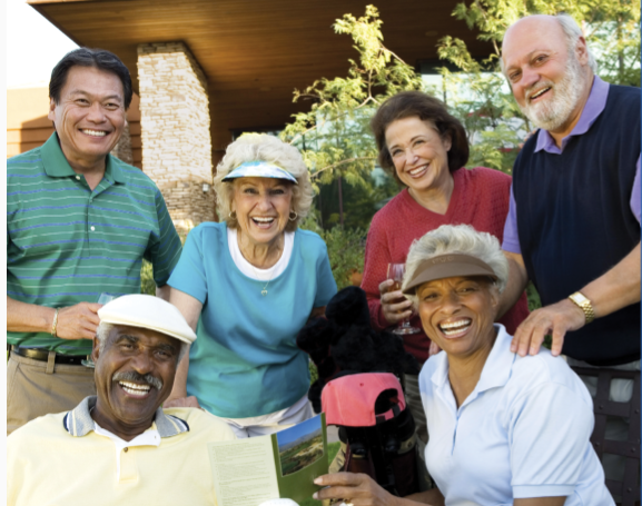 Group of six older adults smiling.